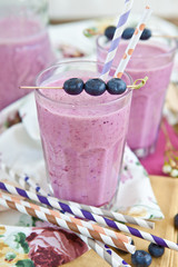 Homemade milkshake with fresh blueberries