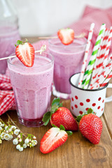 Homemade milkshake with fresh strawberries