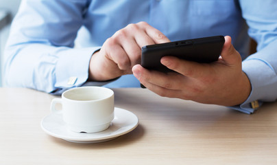 Businessman relaxing during coffee break at workplace