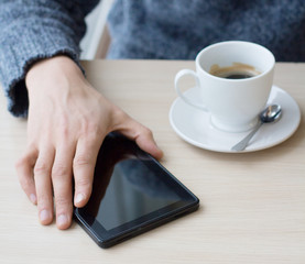 Businessman relaxing during coffee break at workplace