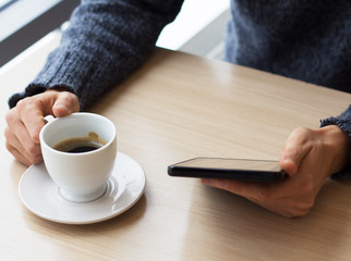Businessman relaxing during coffee break at workplace