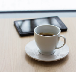 Businessman relaxing during coffee break at workplace