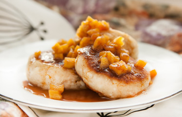 Homemade cheese pancakes with caramelized apples