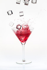 Ice cubes falling into a blended drink