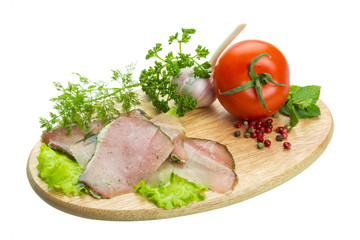 Ripe fresh ham with vegetables