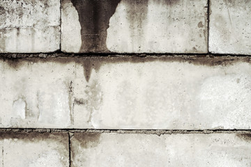 dirty old wall from concrete blocks