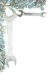 Bolts, screws, nuts, wrenches isolated on white