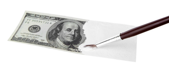 Making fake dollar isolated on white