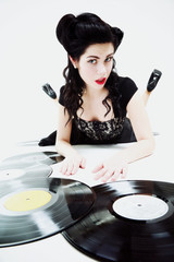 Sexy girl with phonography analogue record