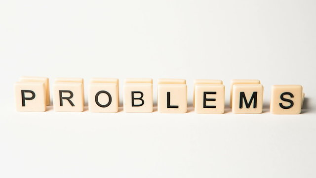Letter pieces spelling problems and solutions standing up