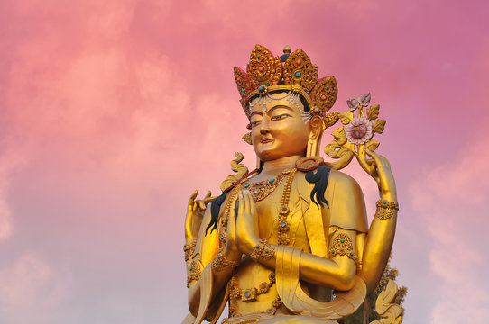 Golden statue of Tibetan Avaloketishvara ( Chenresig ) buddha