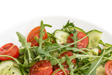 salad from ruccola, cherry tomatoes and cucumber