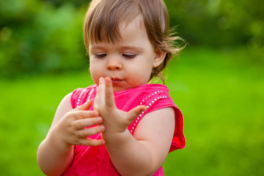 Little Girl Counting Her Fingers