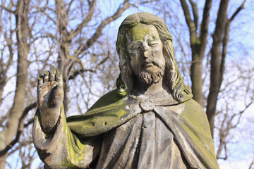 Obraz premium Historic Jesus on the old Prague Cemetery, Czech Republic
