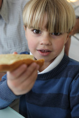 Boy with slice of bread