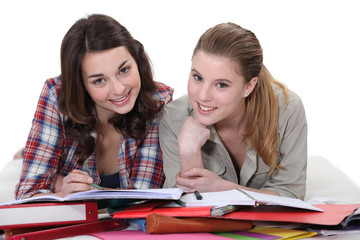 Two female students revising together