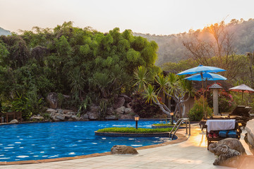 Outdoor Swimming Pool in sunset time