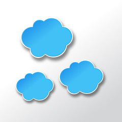 Obraz premium Blue clouds on grey shiny sky. Paper-cut effect