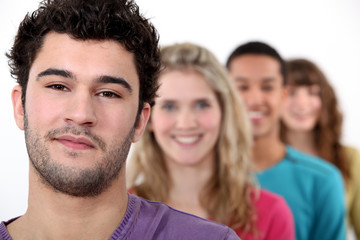 Fototapeta premium Young people standing in a row