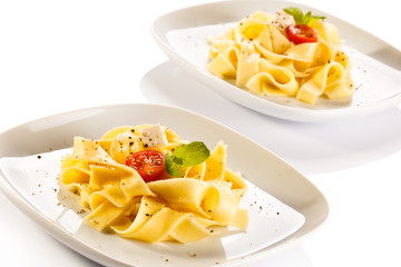 Pasta with tomatoes and white cheese