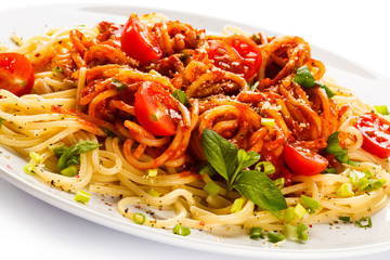 Pasta with meat, tomato sauce, parmesan and vegetables