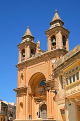Fototapeta na wymiar The church of Marsaxlokk, a village in Malta