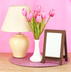 Brown photo frame and lamp