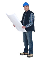Foreman holding plans