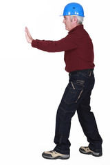 Senior laborer on white background