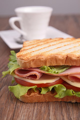 sandwich on wood background