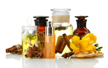 Bottles with ingredients for the perfume, isolated on white