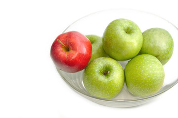 Green  red apple in glass bowl