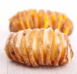 sliced baked potato with cheese