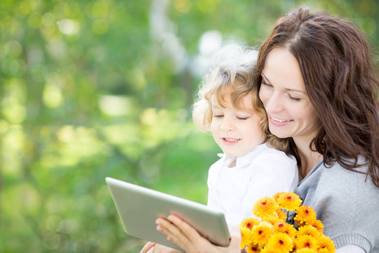 Happy Family Using Tablet PC