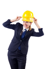 Young businesswoman with hard hat on white