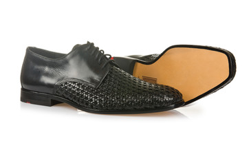 Fashion concept with male shoes on white