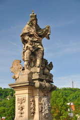 Fototapeta na wymiar Saint Ludmila statue in Charles bridge, Prague