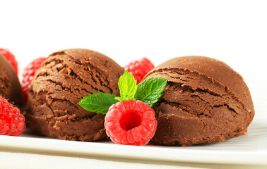 Chocolate ice cream with fresh raspberries