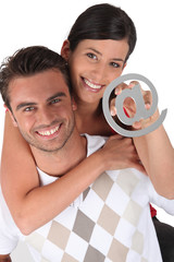 Couple holding at symbol