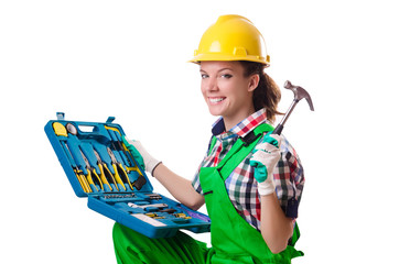 Young woman with toolkit on white