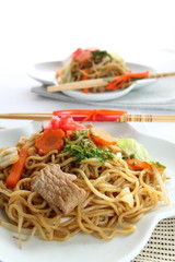 Japanese cuisine, fried noodles with carrot and pork