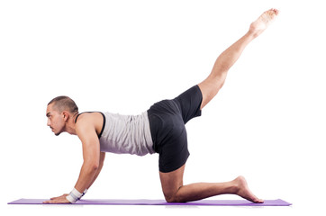 Man doing exercises on white