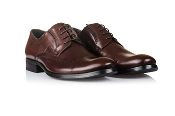 Fashion concept with male shoes on white