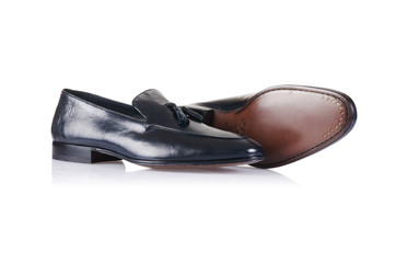 Fashion concept with male shoes on white