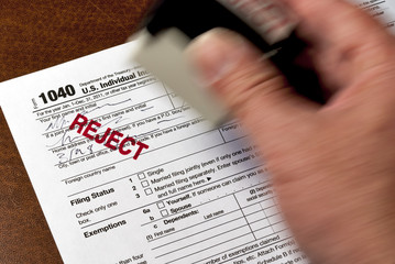 Fototapeta premium Tax form is stamped reject