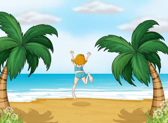 Poster Een meisje geniet van de zomer op het strand © GraphicsRF