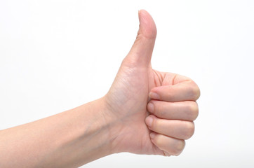close up of hand with thumb up isolated on white background