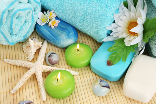 Towels, soap, flower, candles