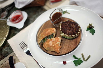 Cutlet with pasty and sauce