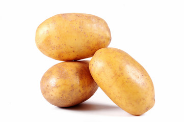 Potato on white background close up